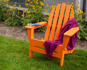 classic folding adirondack chair in tangerine