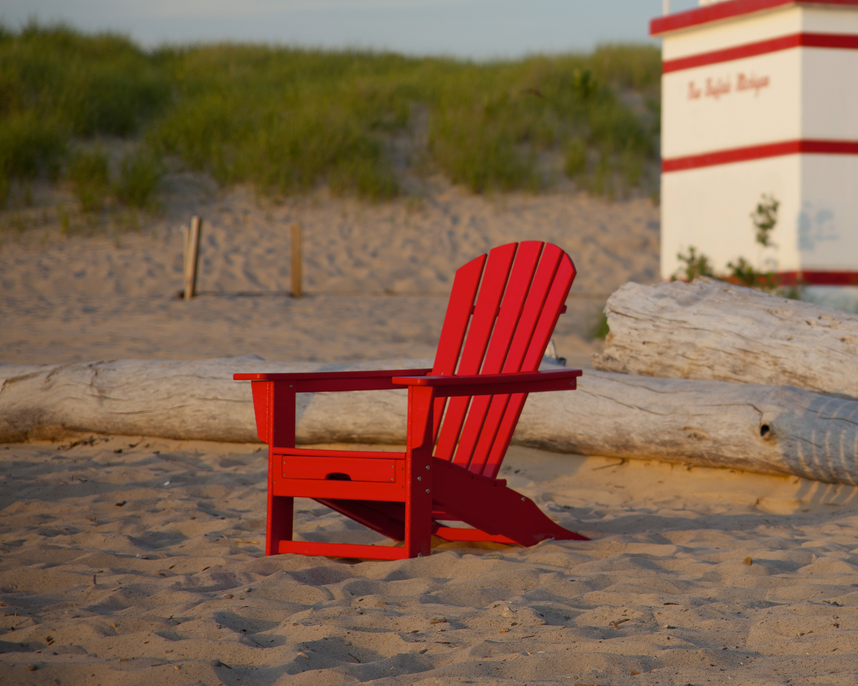 palm coast ultimate adirondack with hideaway ottoman in sunset red thumbnail image