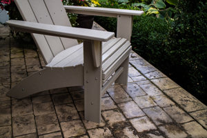 modern curveback adirondack chair in sand thumbnail